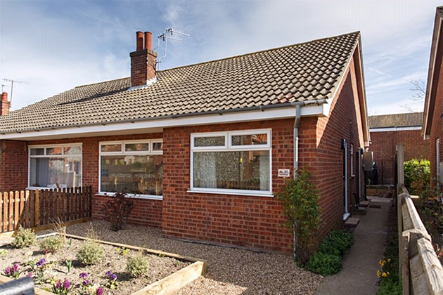 No. 21 exterior view, a lovely, light, 2-bedroom bungalow with great space for 3 people