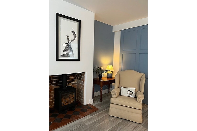 Barnfield Lodge's lounge with chimney